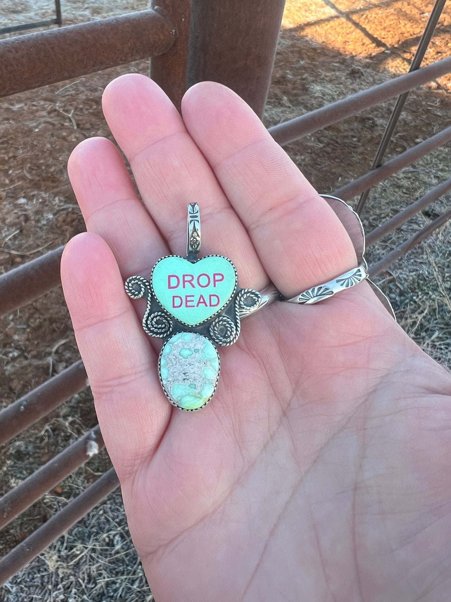 "Drop Dead" heart pendant